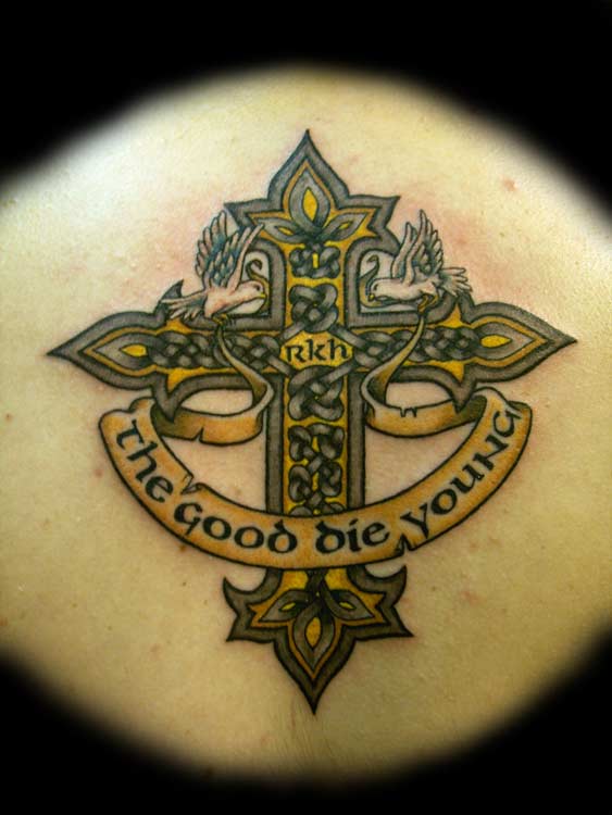 cross tattoos with wings on arm. celtic arm tattoo. men