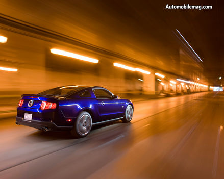 0811_09_b+2010_ford_mustang+rear_three_quarter_view