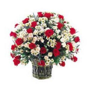 kosárban piros és fehér virágok