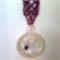  makramé mintával díszített bőrnyaklánc drótékszerből készített medállal 