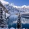 Winter-snow-covered-mountains-and-trees-icy-lake_1366x768