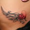 Tetoválás 15 Bikini vonalban tetkó szárnyas sziv.
