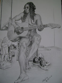 Jamanikai férfi gitárral