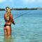 Bikini bum fishing girl