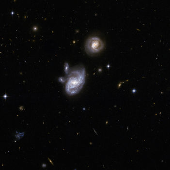 Hubble Interacting Galaxy 2MASX J09133888-1019196