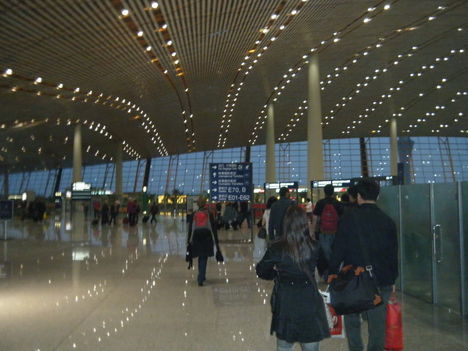 pekingi reptér útban a kapuhoz