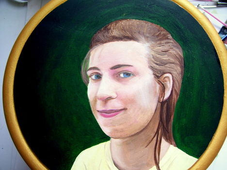 portré arany keretben
