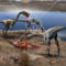 24411_clipart_photo_of_a_herd_of_coelophysis_dinosaurs_dining_on_a_bloody_kill_on_the_shore_of_a_lake