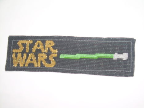 star wars logó, fénykarddal