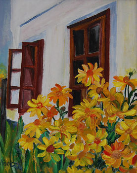 Sárga virágok a ház előtt
