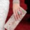 0227-milla_jovovich_nails_bd